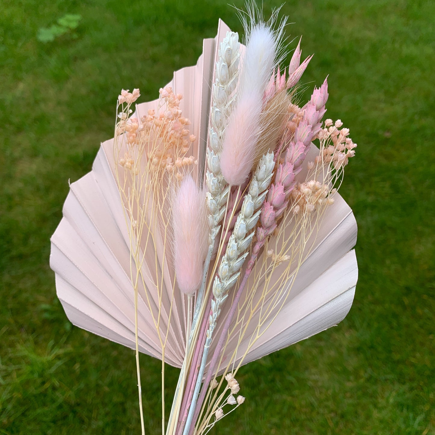 Baby pink palm spear with dried flowers for cake decor