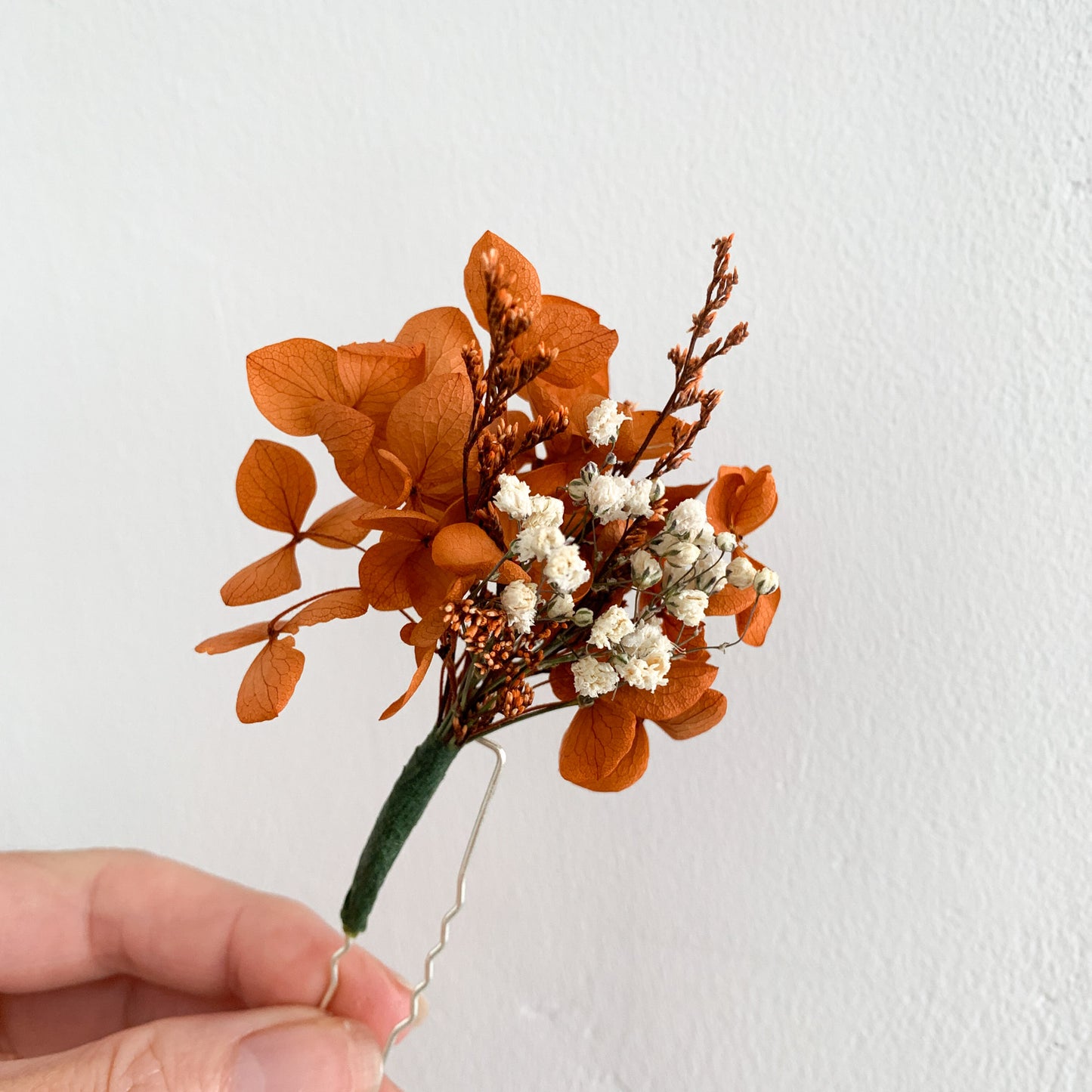 burnt orange and gypsophila hair pins