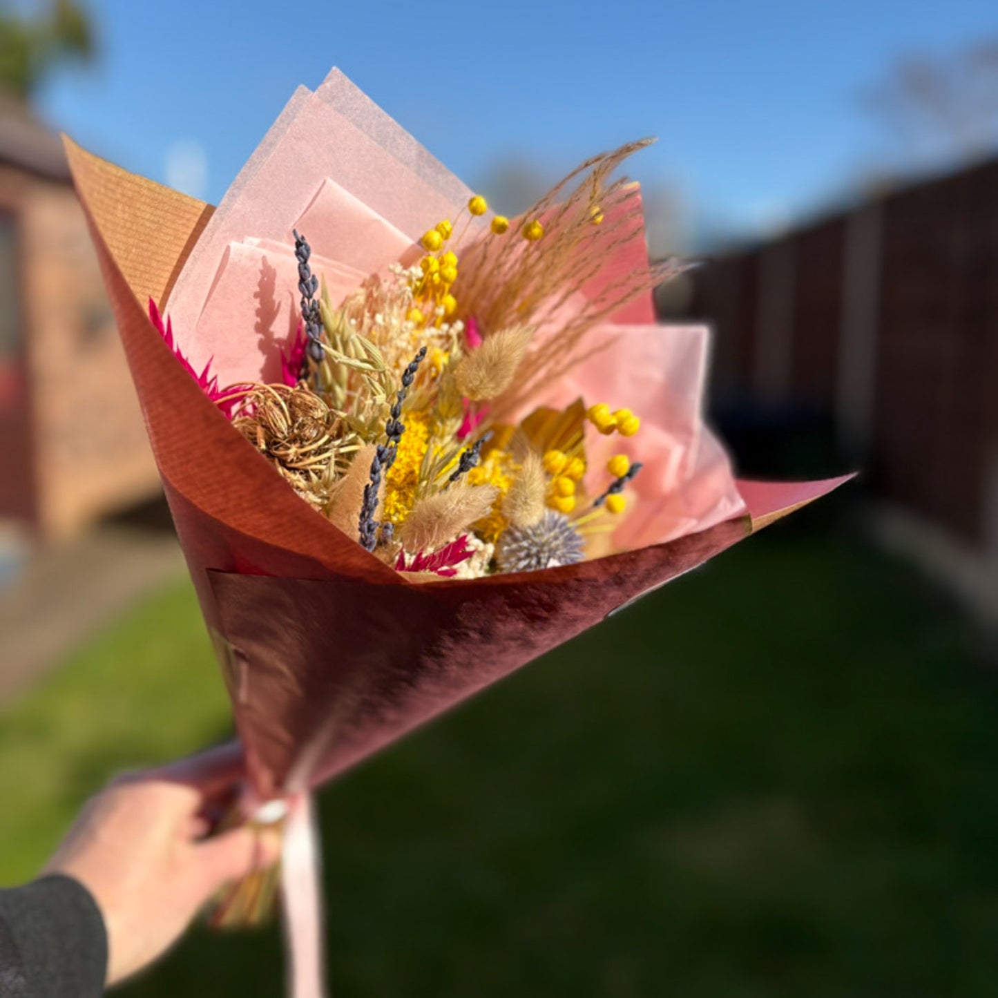 yellow and lavender dried flower bouquet