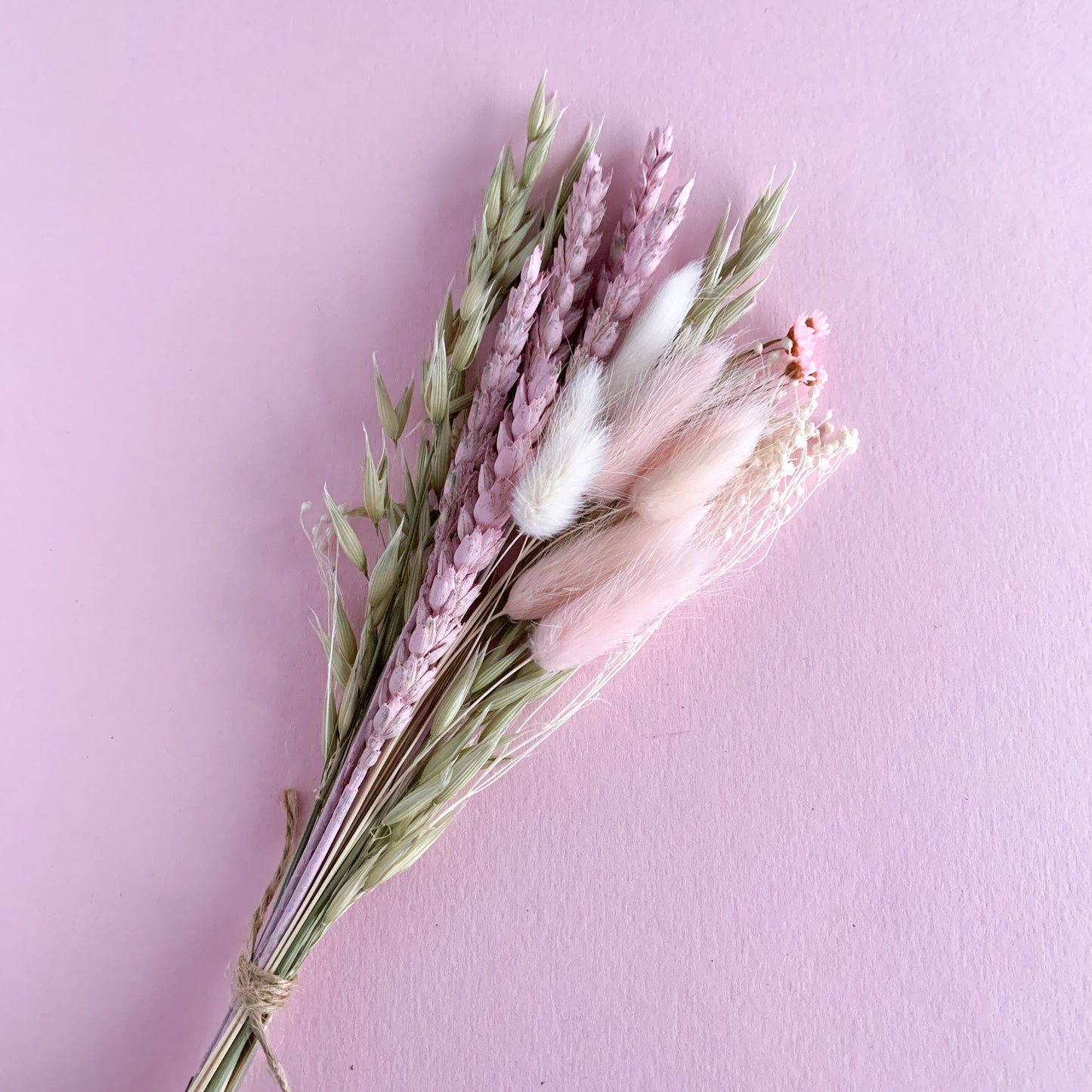 pink and sage dried flower bunch for cake topper decor
