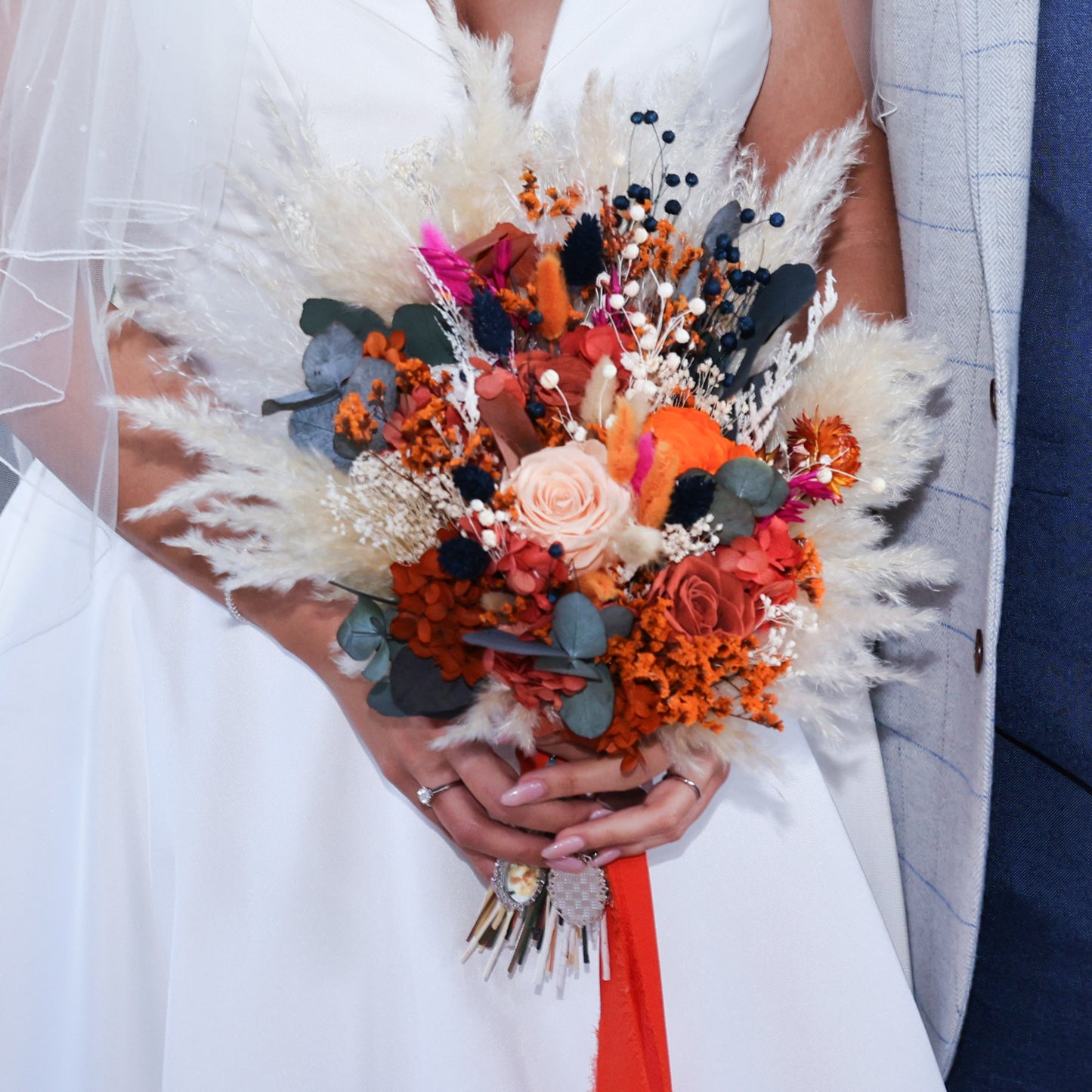 orange dried flower wedding bouquet