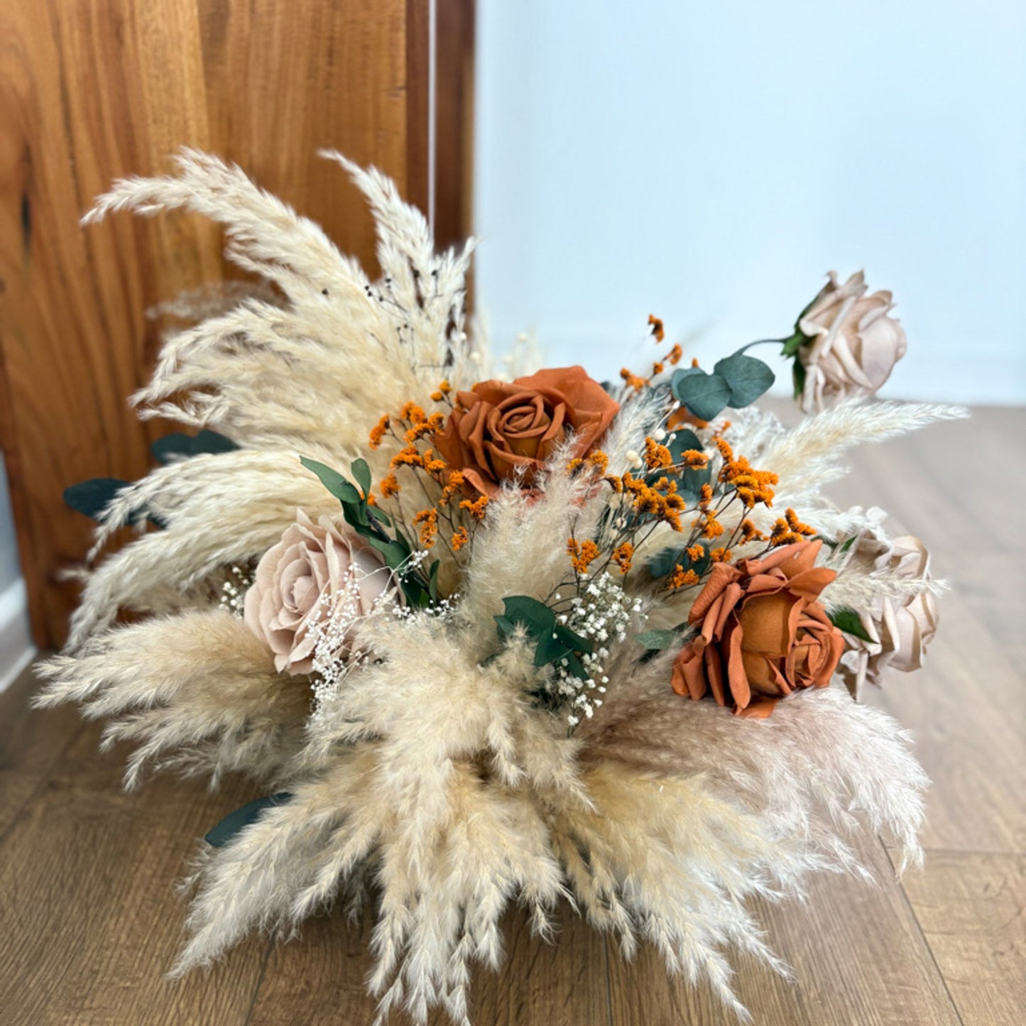 burnt orange wedding centrepiece