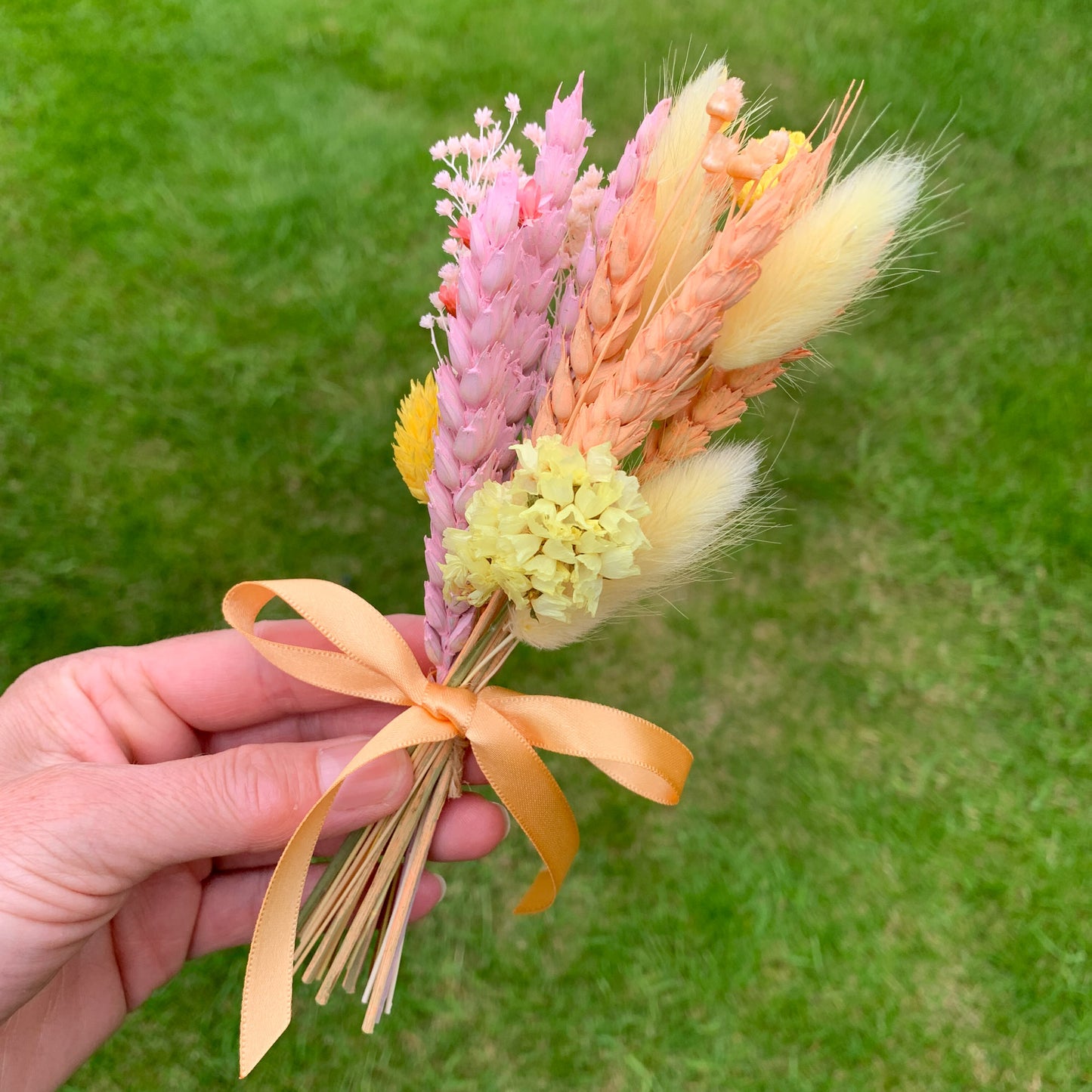 dried flower bouquet in peach and pink bridesmaid proposal