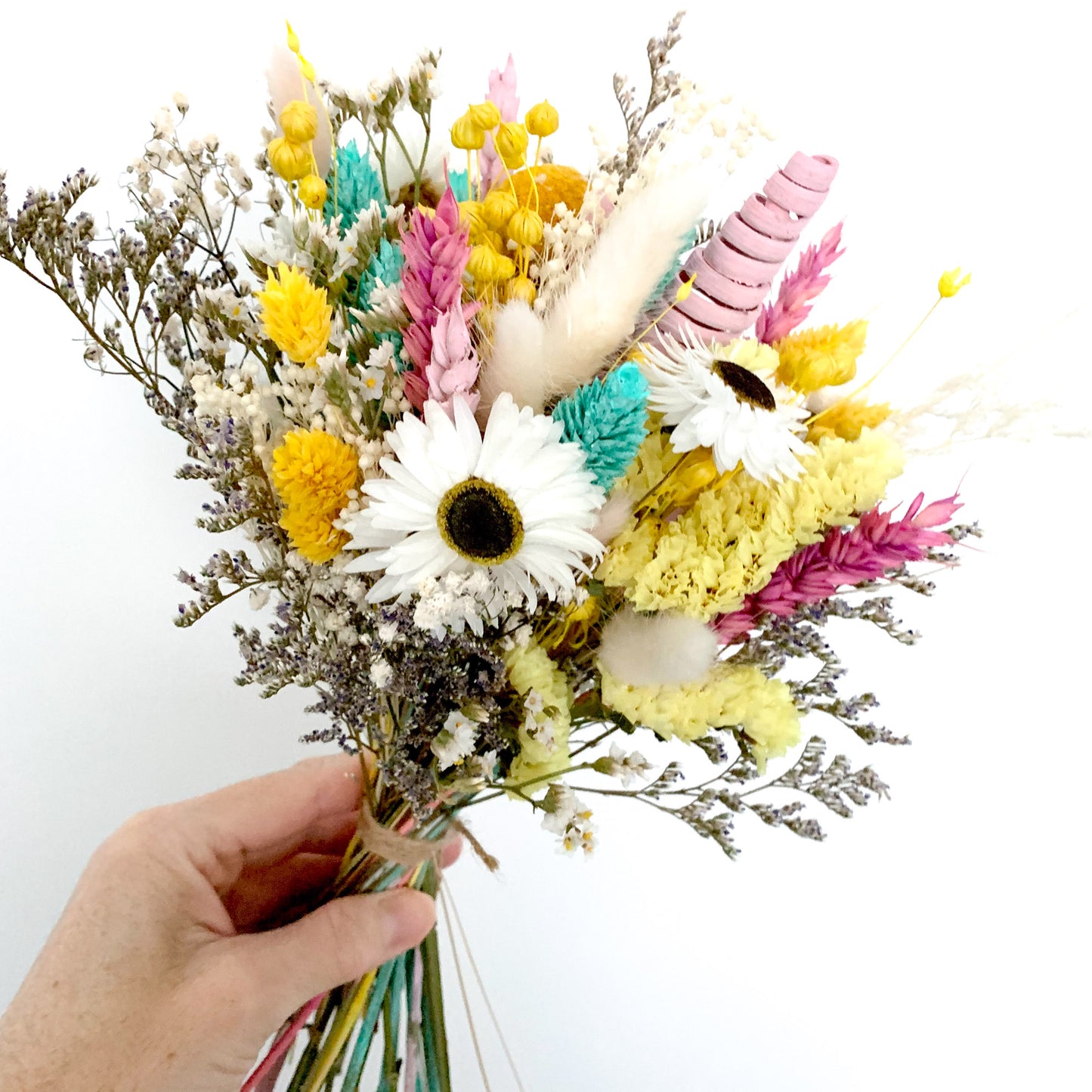 pink and yellow dried flower bouquet