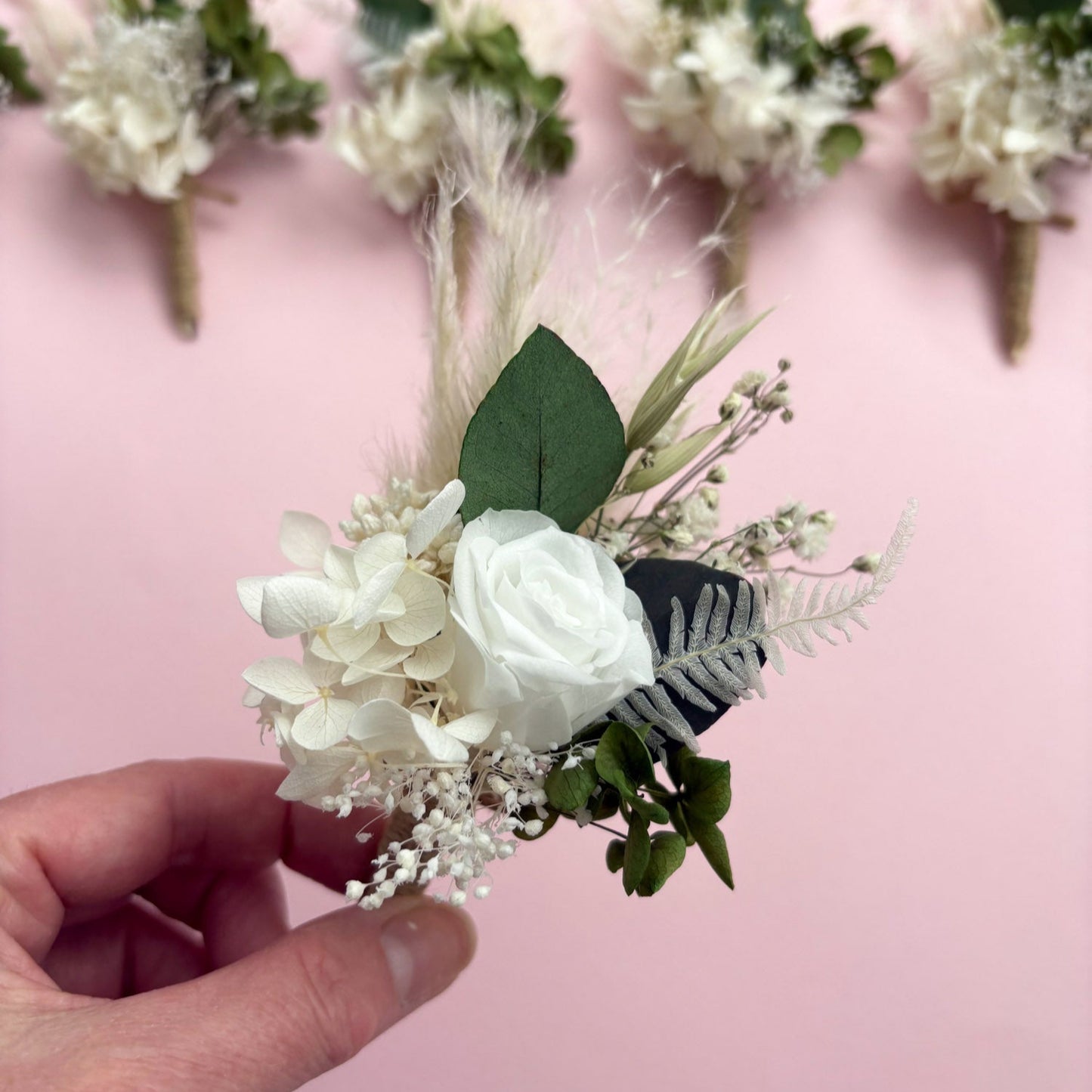 white rose and eucalyptus buttonhole