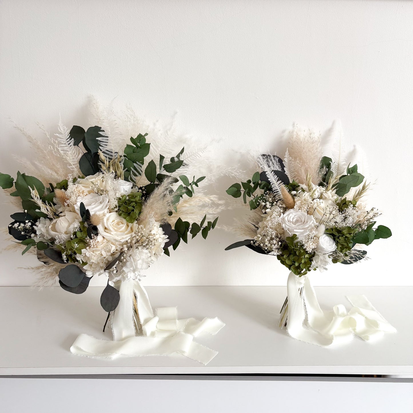 white and green eucalyptus wedding bouquets