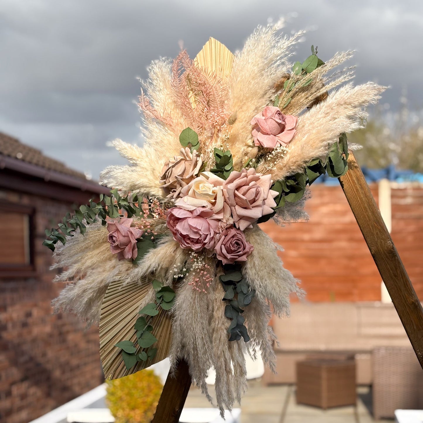 blush pink pampas for wedding arbor