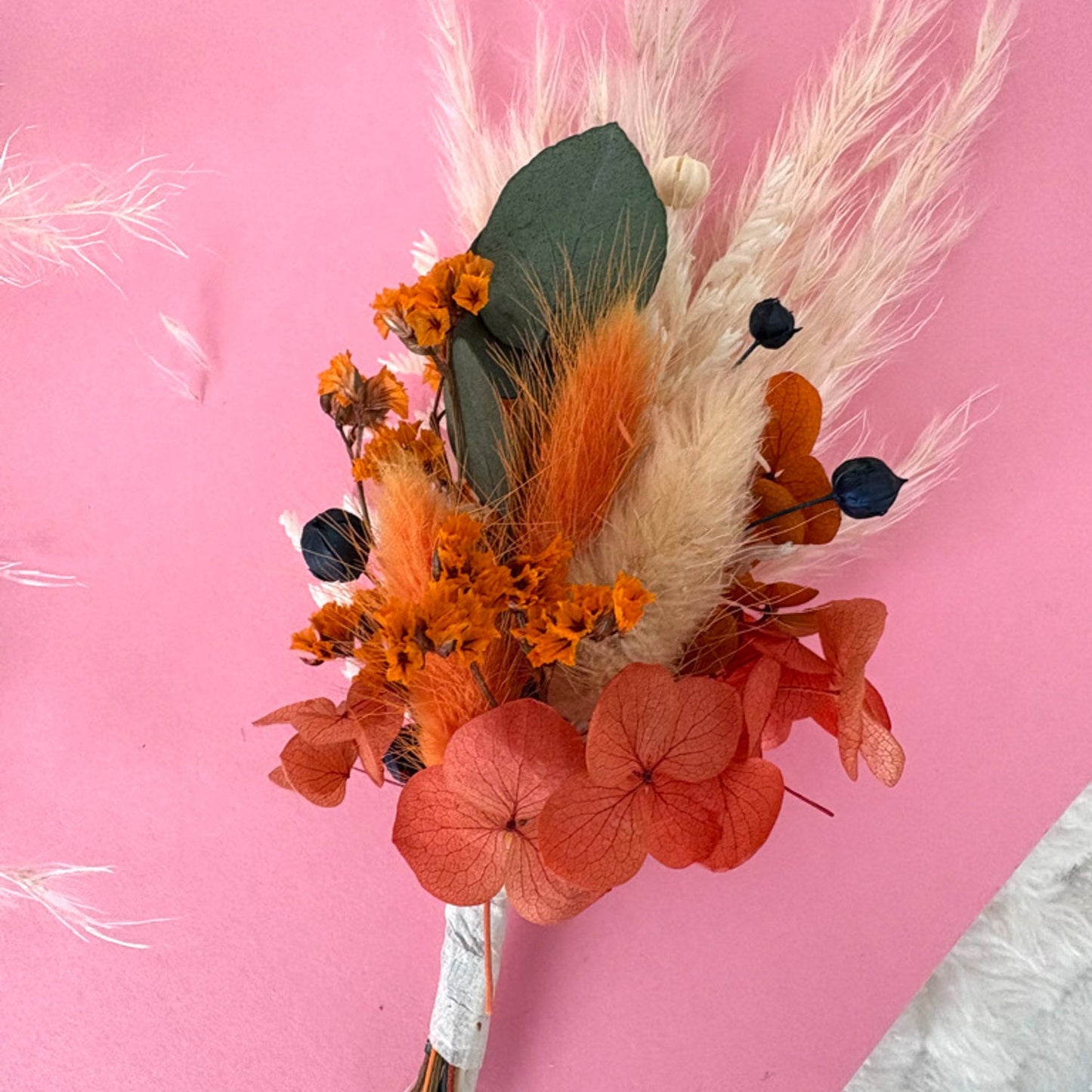 orange and navy buttonhole