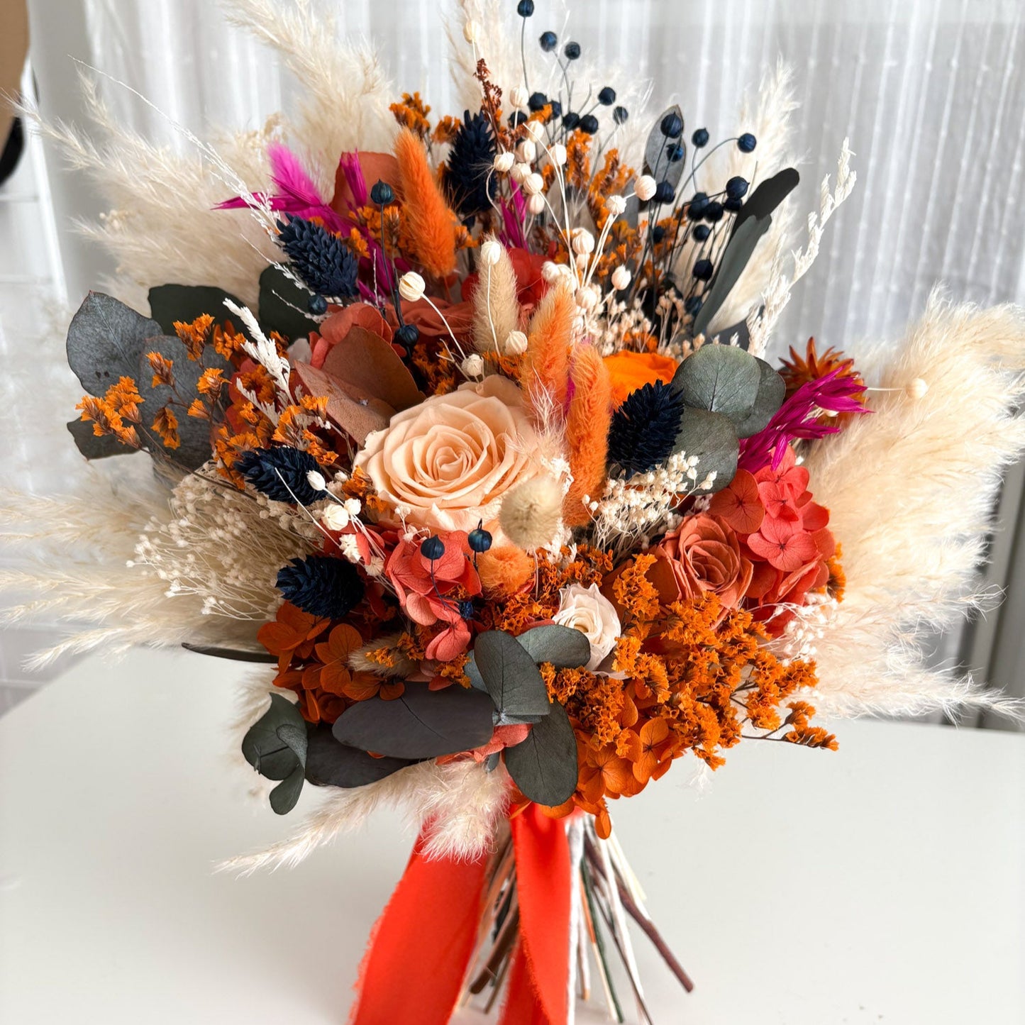 orange and navy bridal bouquet