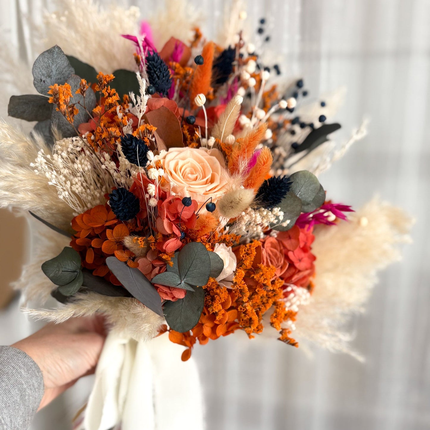 orange dried flower bridal bouquet