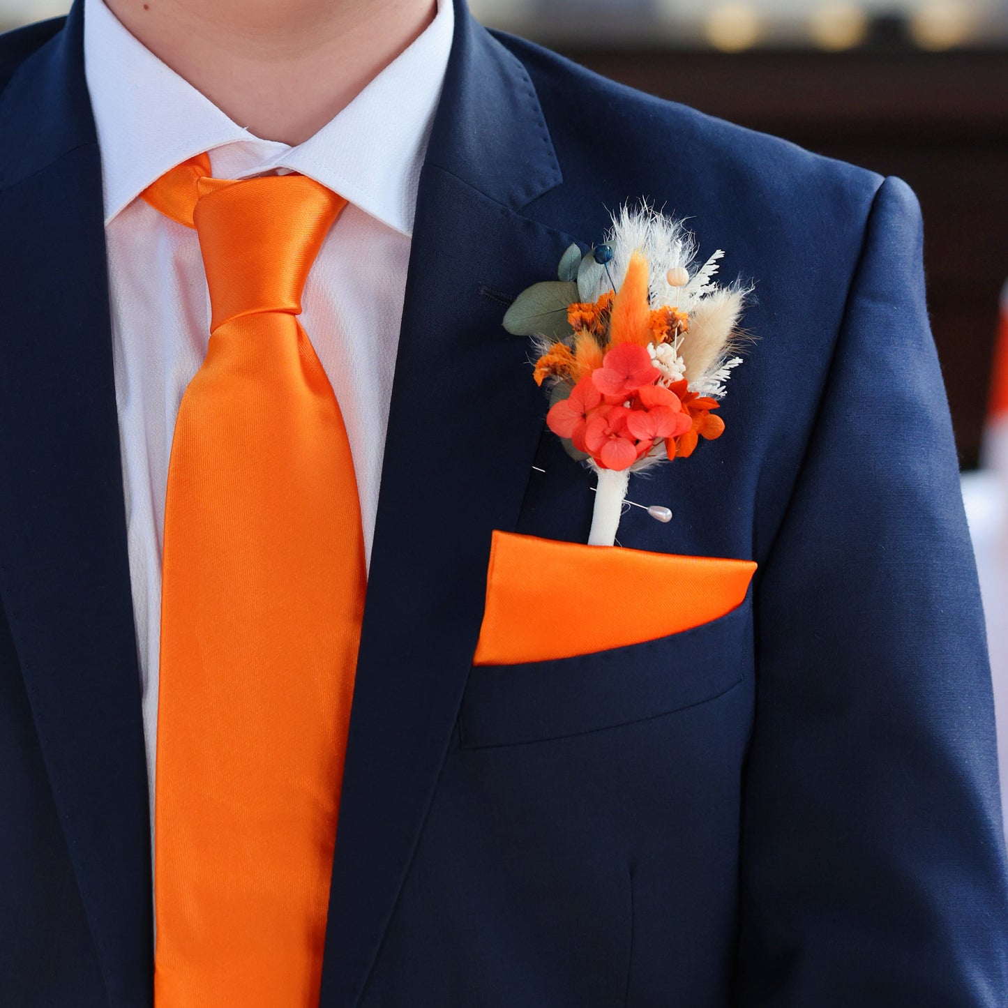 burnt orange buttonhole