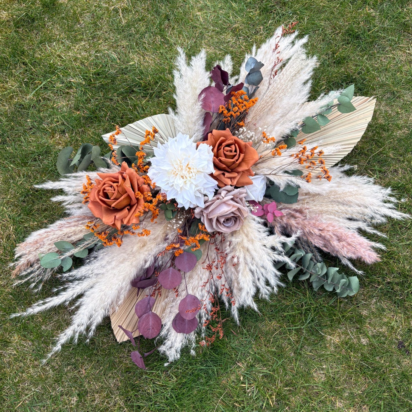burnt orange pampas swag for wedding signage