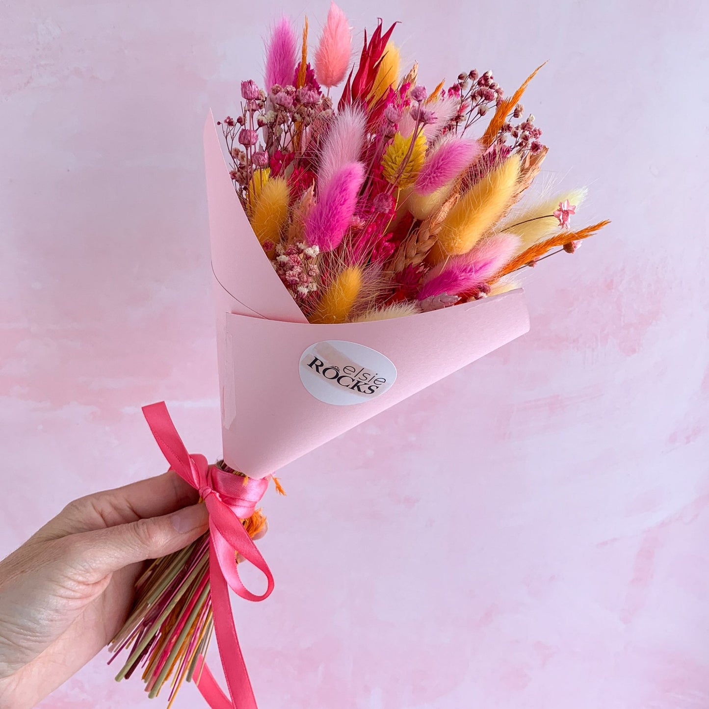 pink and orange dried flower bouquet