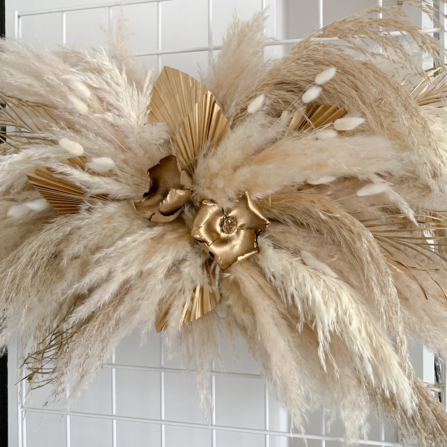 neutral pampas arrangement with gold