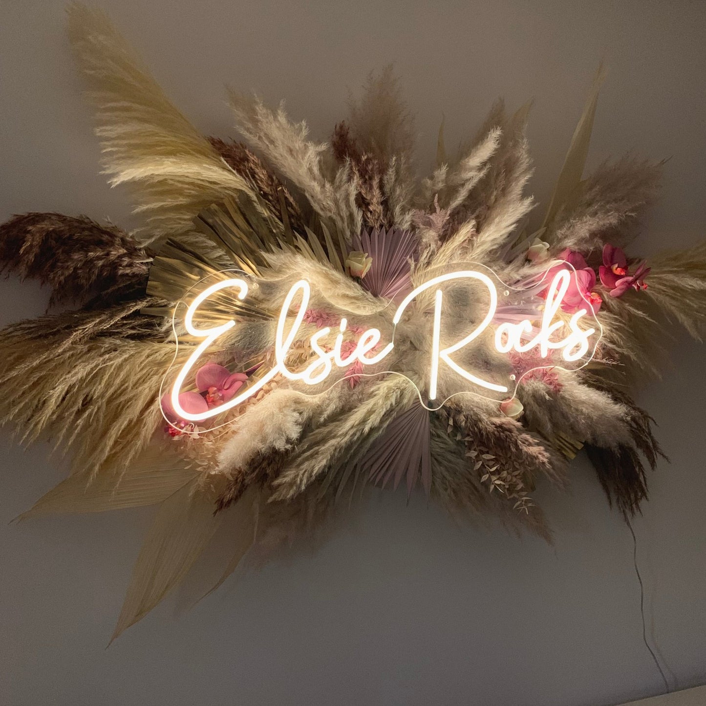 pampas and neon wall decor