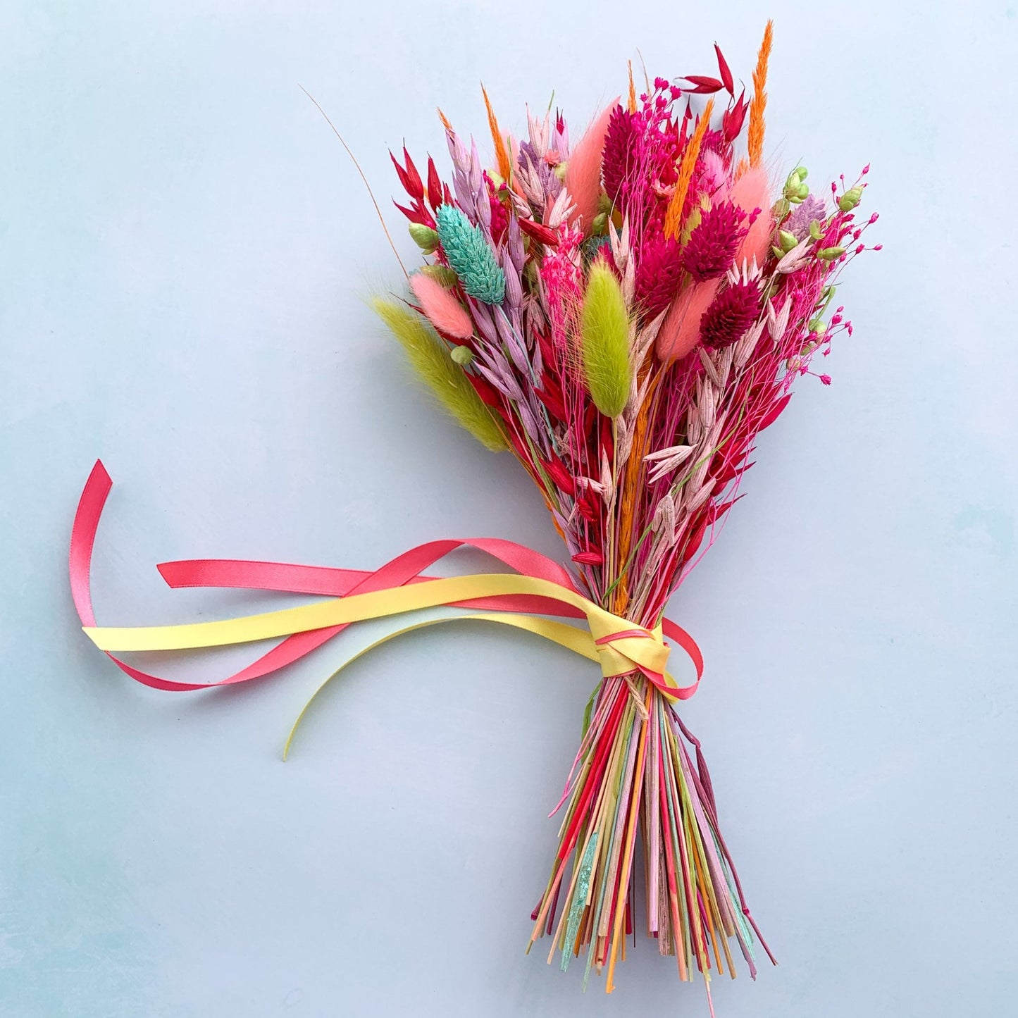 dried flower bunch in bright rainbow colours