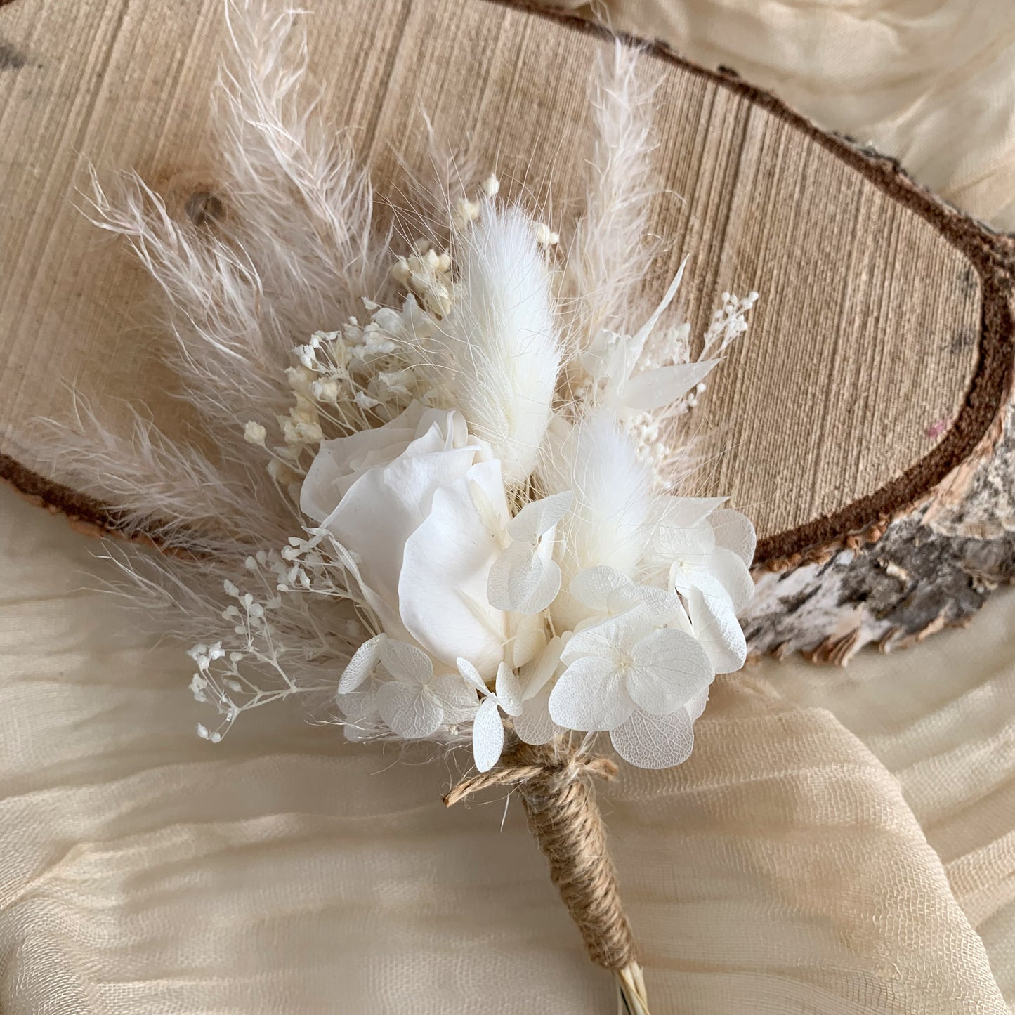 white rose buttonhole