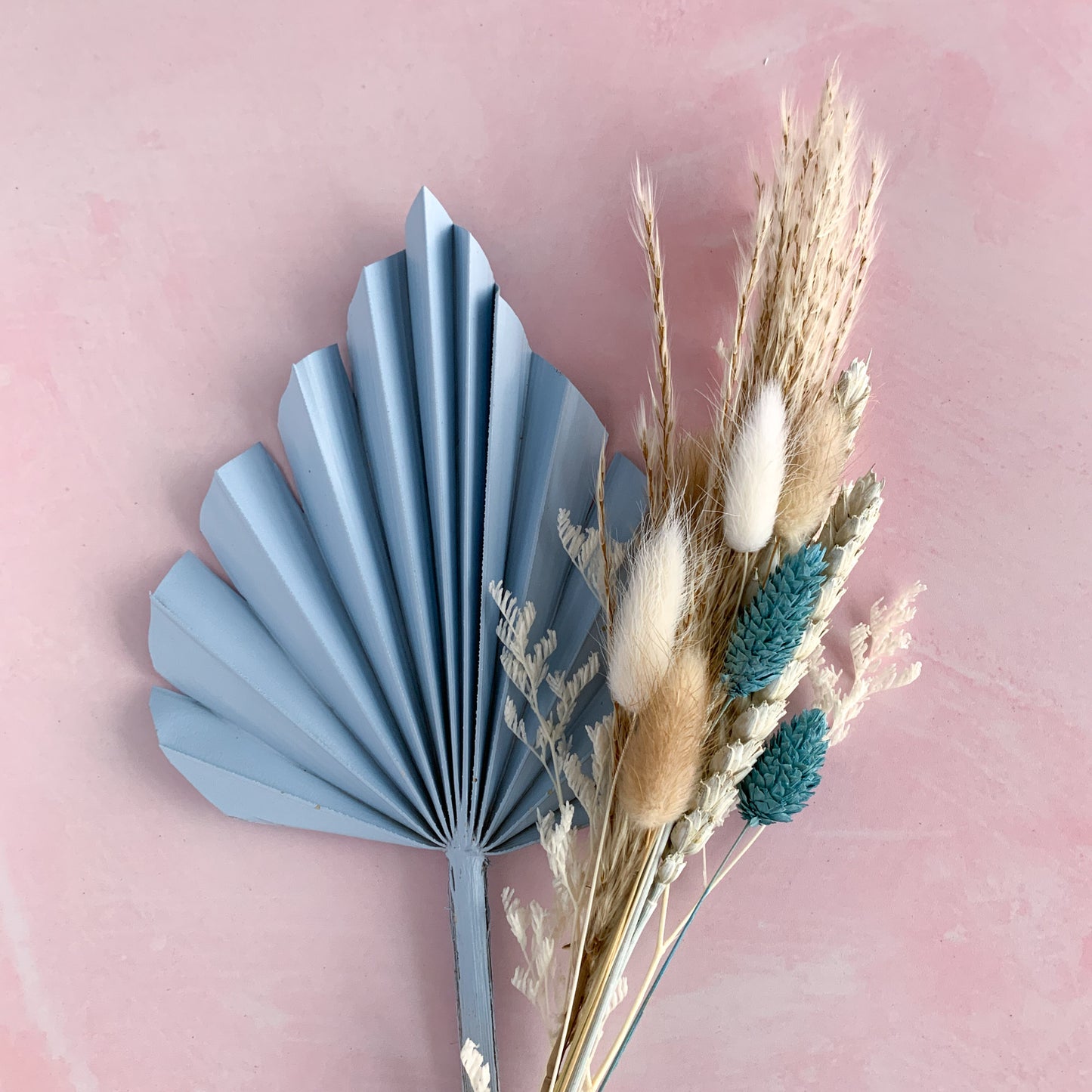 baby blue dried flower cake topper with palm spear