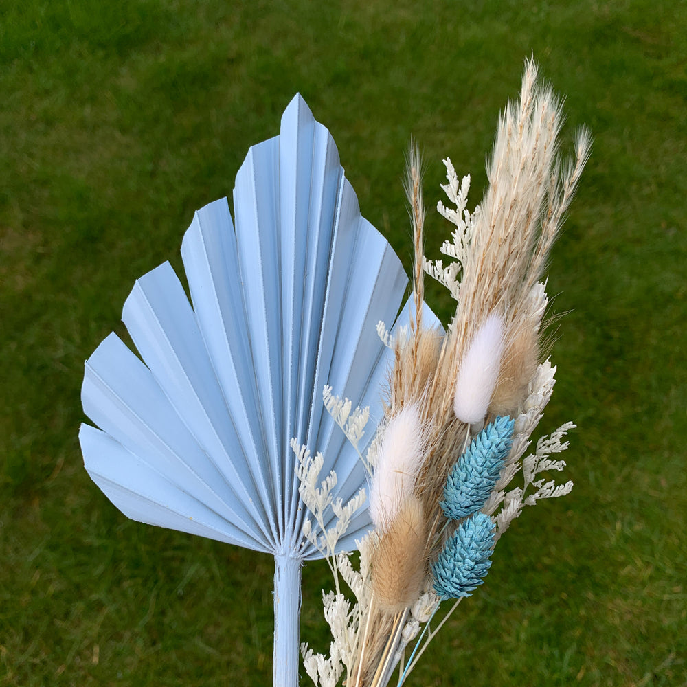 
                      
                        blue palm spear and dried flower bunch
                      
                    