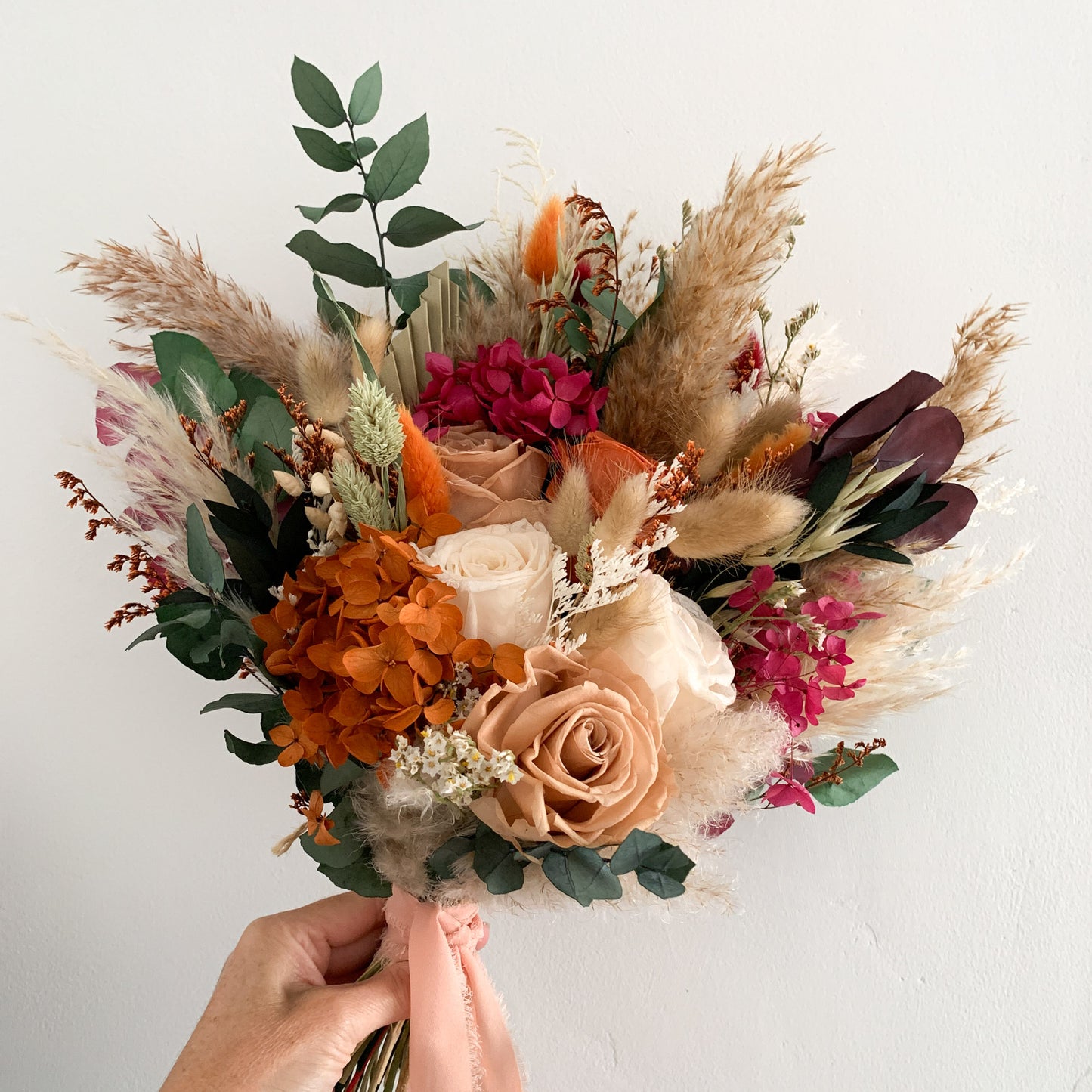 burnt orange and deep red wedding bouquet