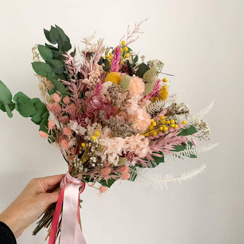 
                      
                        Pink and Yellow Dried Flower Bridal Bouquet
                      
                    