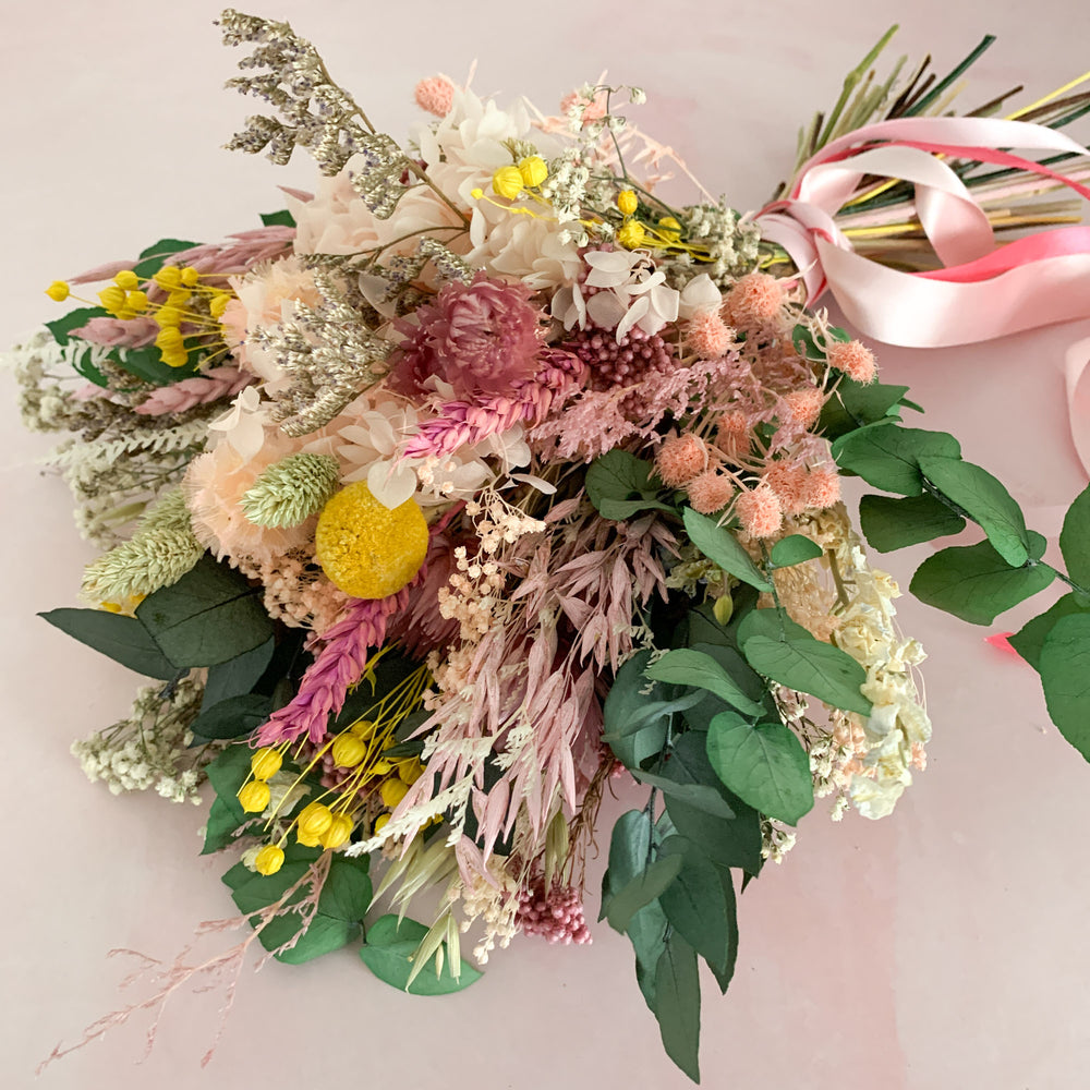 
                      
                        Pink and Yellow Dried Flower Bridal Bouquet
                      
                    