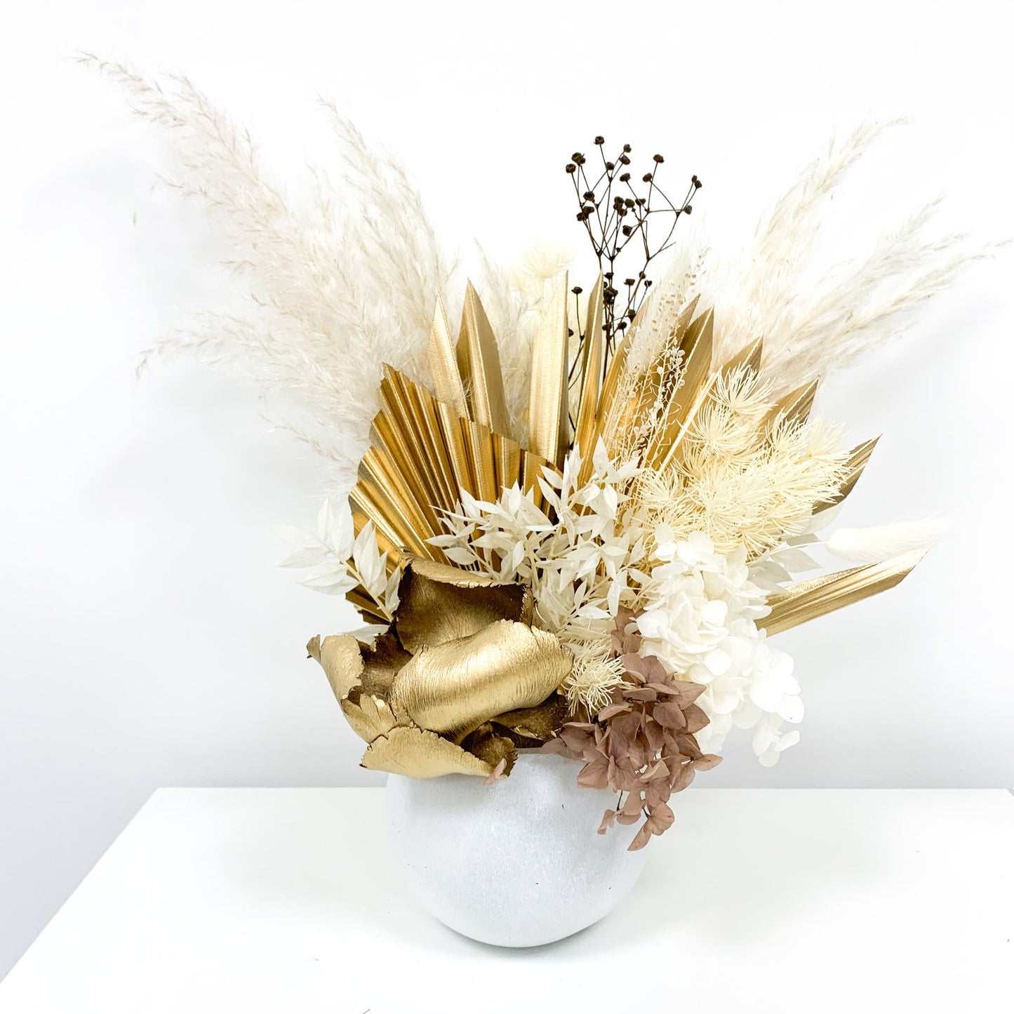 dried flower arranement in pot