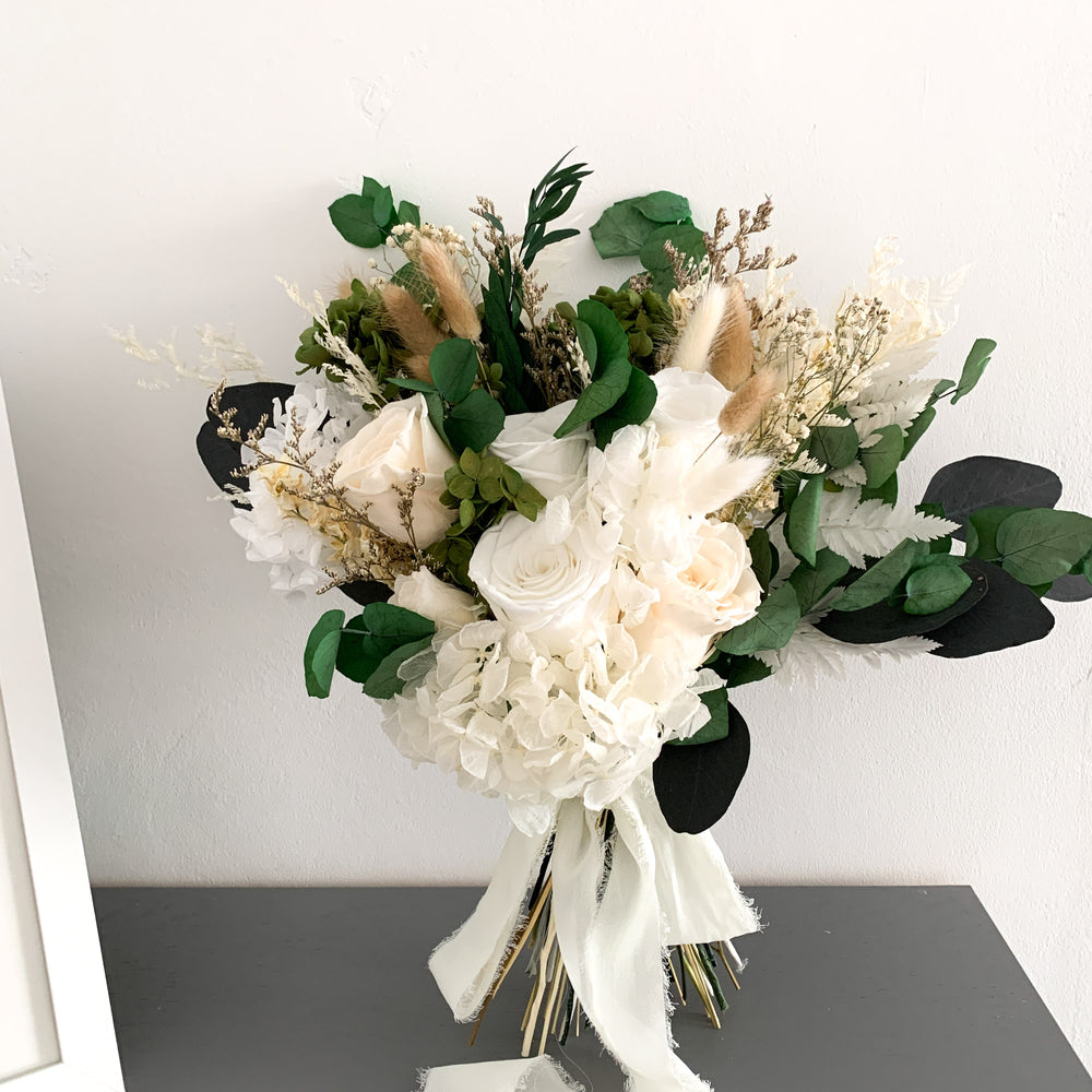 white and green dried flower bridal bouquet