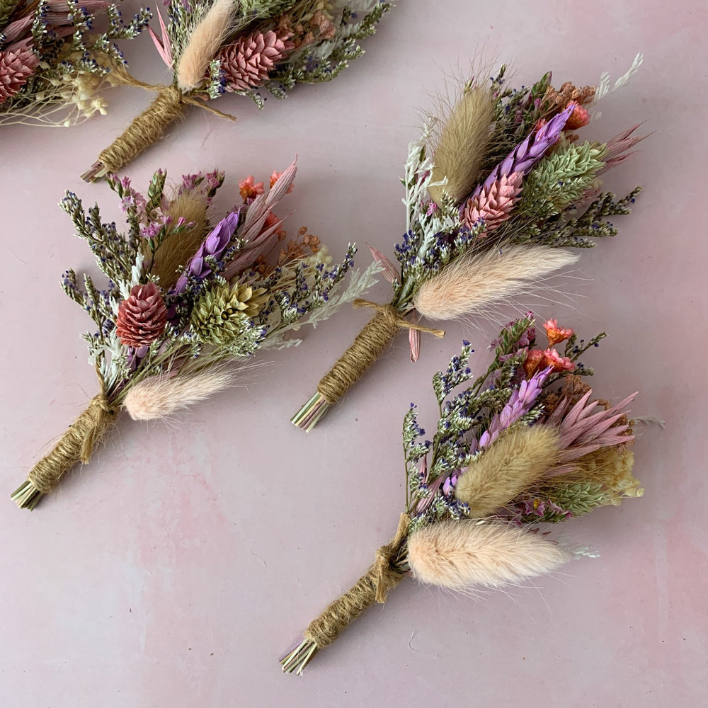 
                      
                        buttonholes for wedding in wild meadow
                      
                    