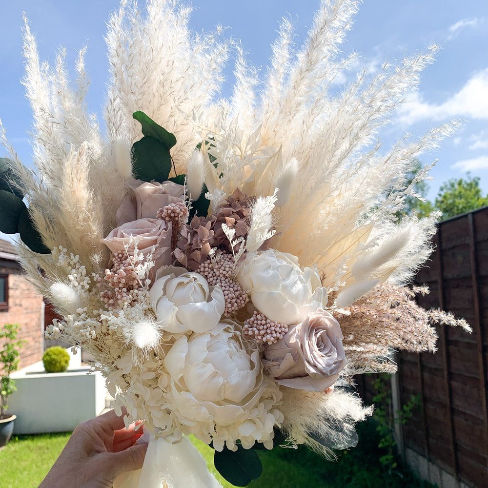 
                      
                        blush dried flower bridal bouquet
                      
                    