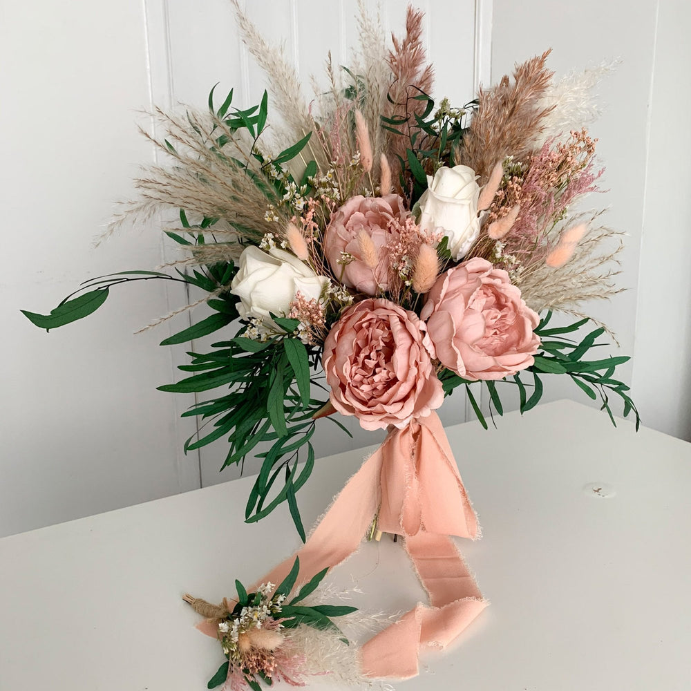 
                      
                        dusky pink peony bridal bouquet
                      
                    