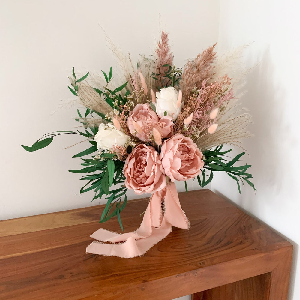 
                      
                        dusty pink bridal bouquet with artificial and dried flowers
                      
                    