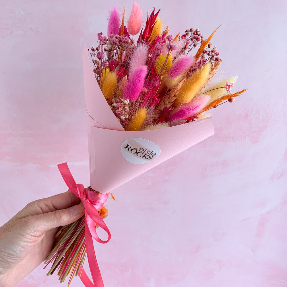 
                      
                        pink and orange dried flower bouquet
                      
                    