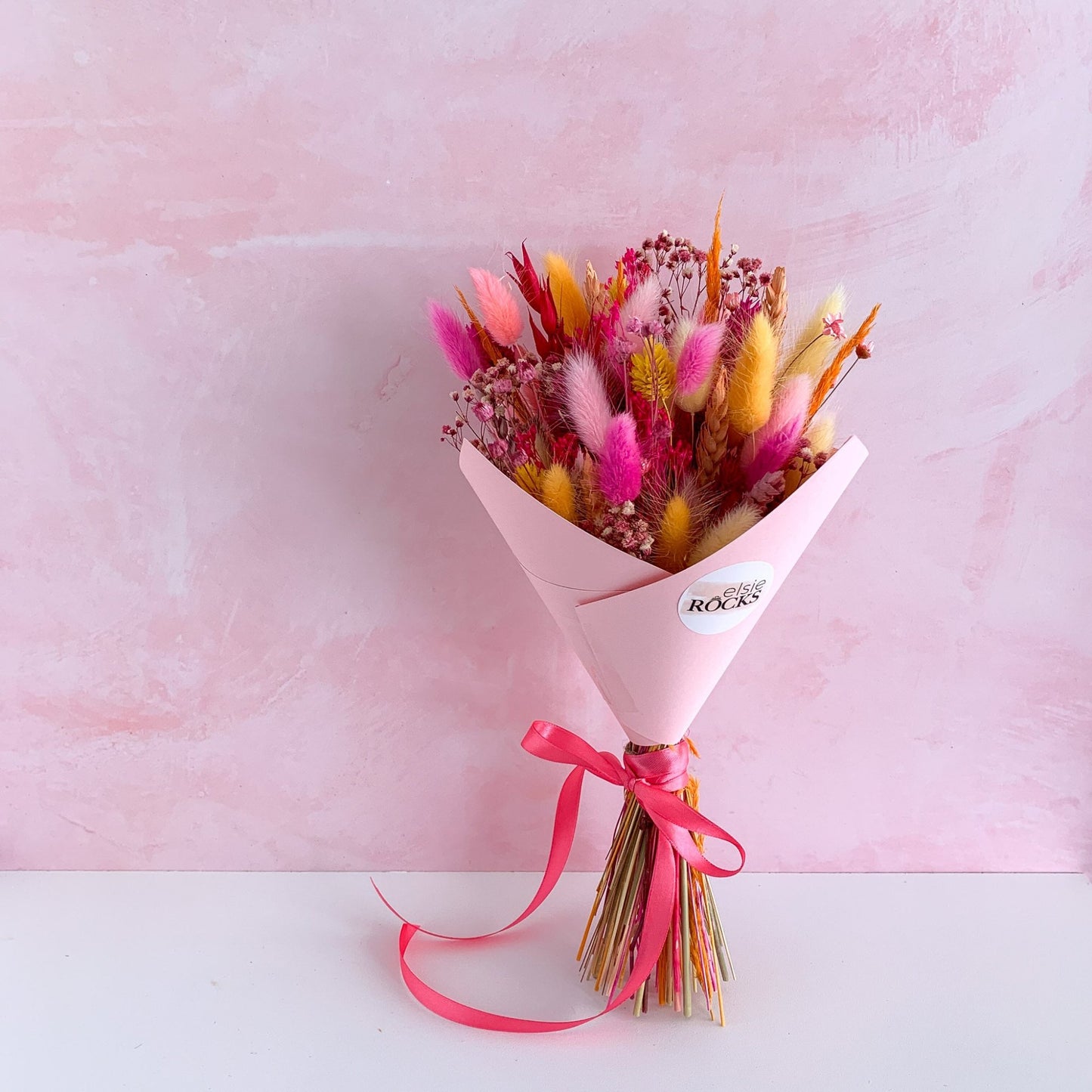 pink and orange dried flower bouqet