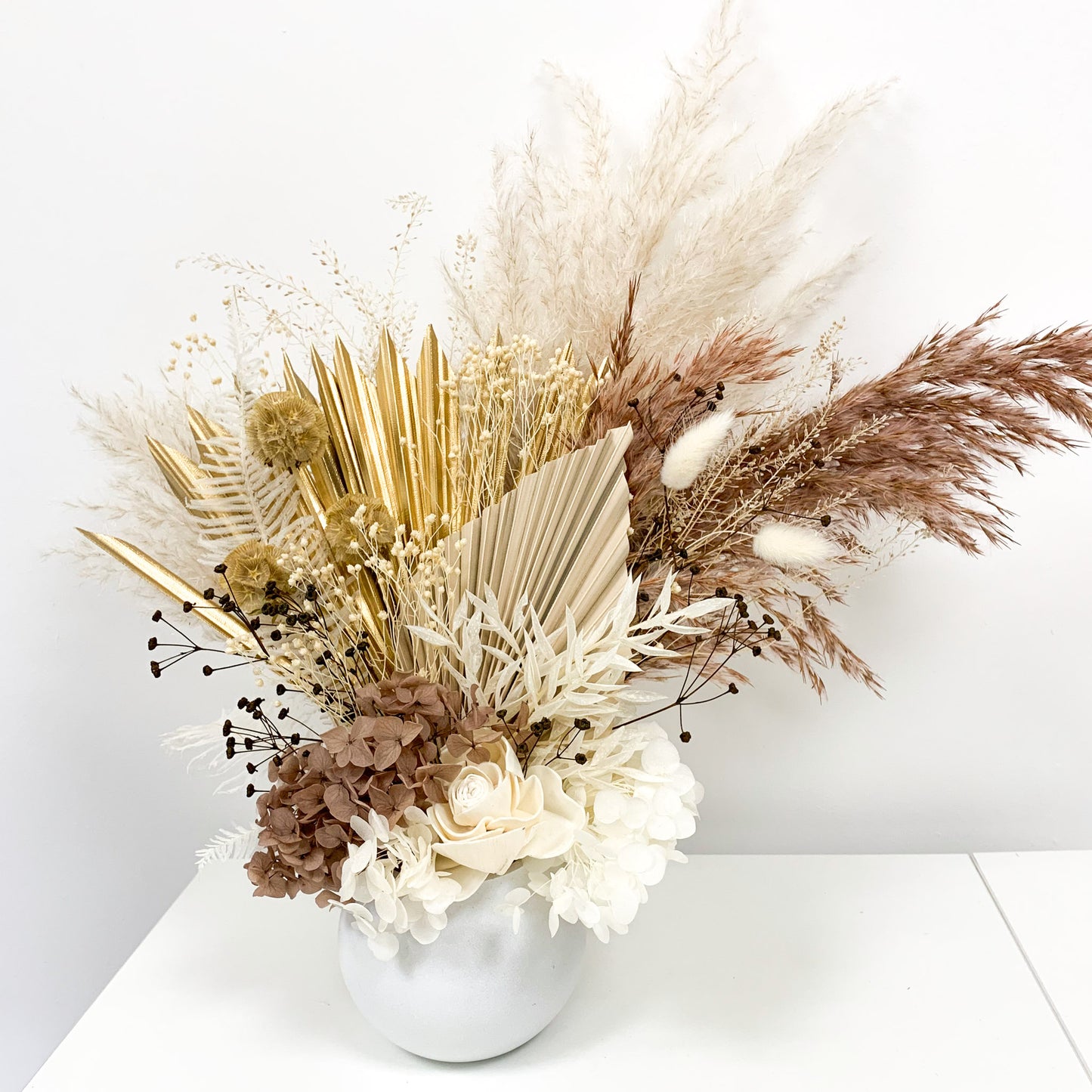 Gold and coffee dried flower pot arrangement