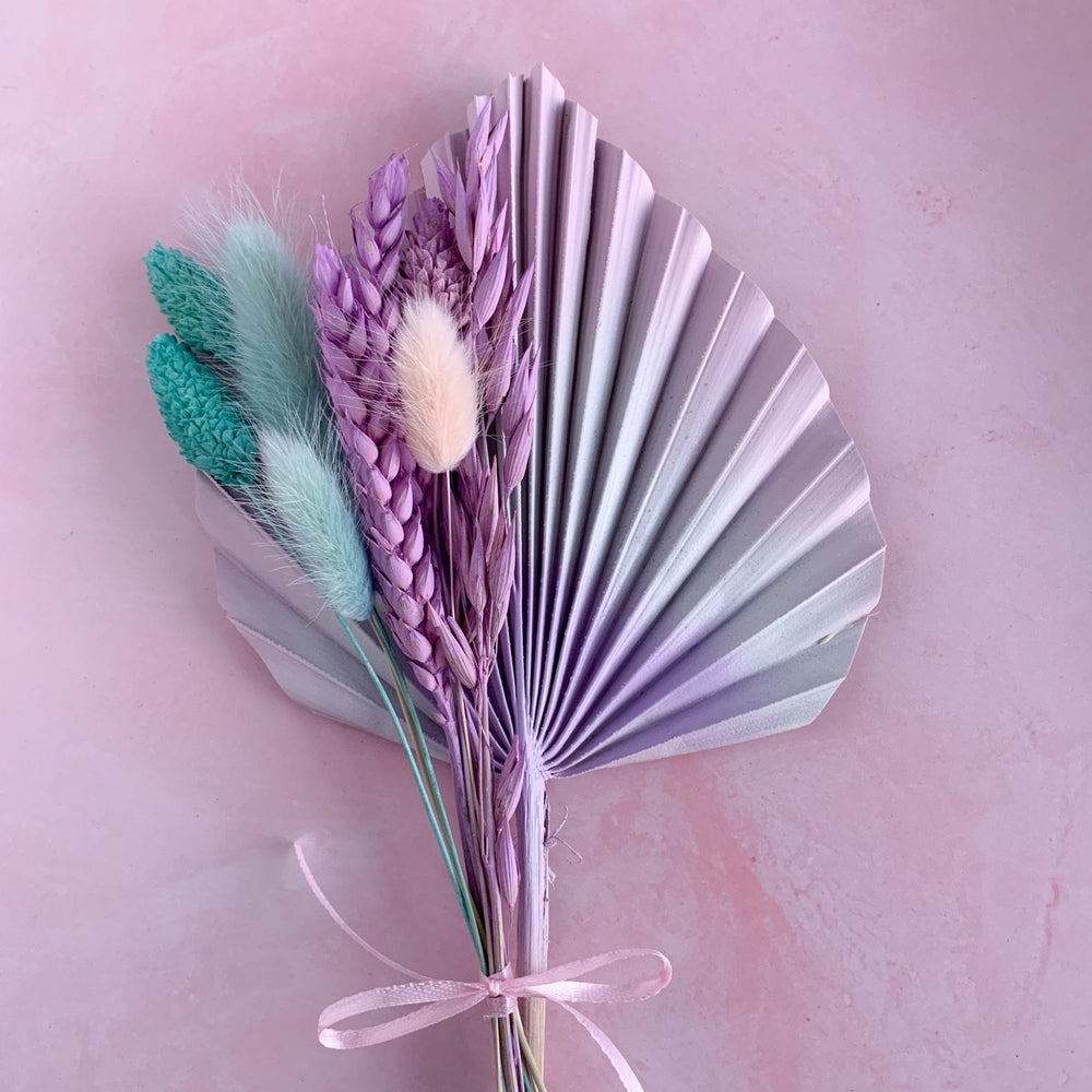 
                      
                        pastel palm spear with dried flowers
                      
                    