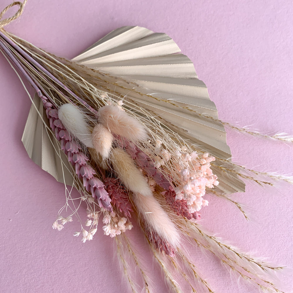 
                      
                        nude palm spear and pink dried flowers
                      
                    