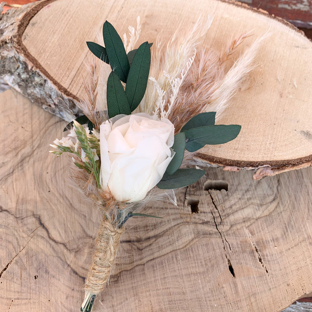 
                      
                        white rose buttonhole
                      
                    