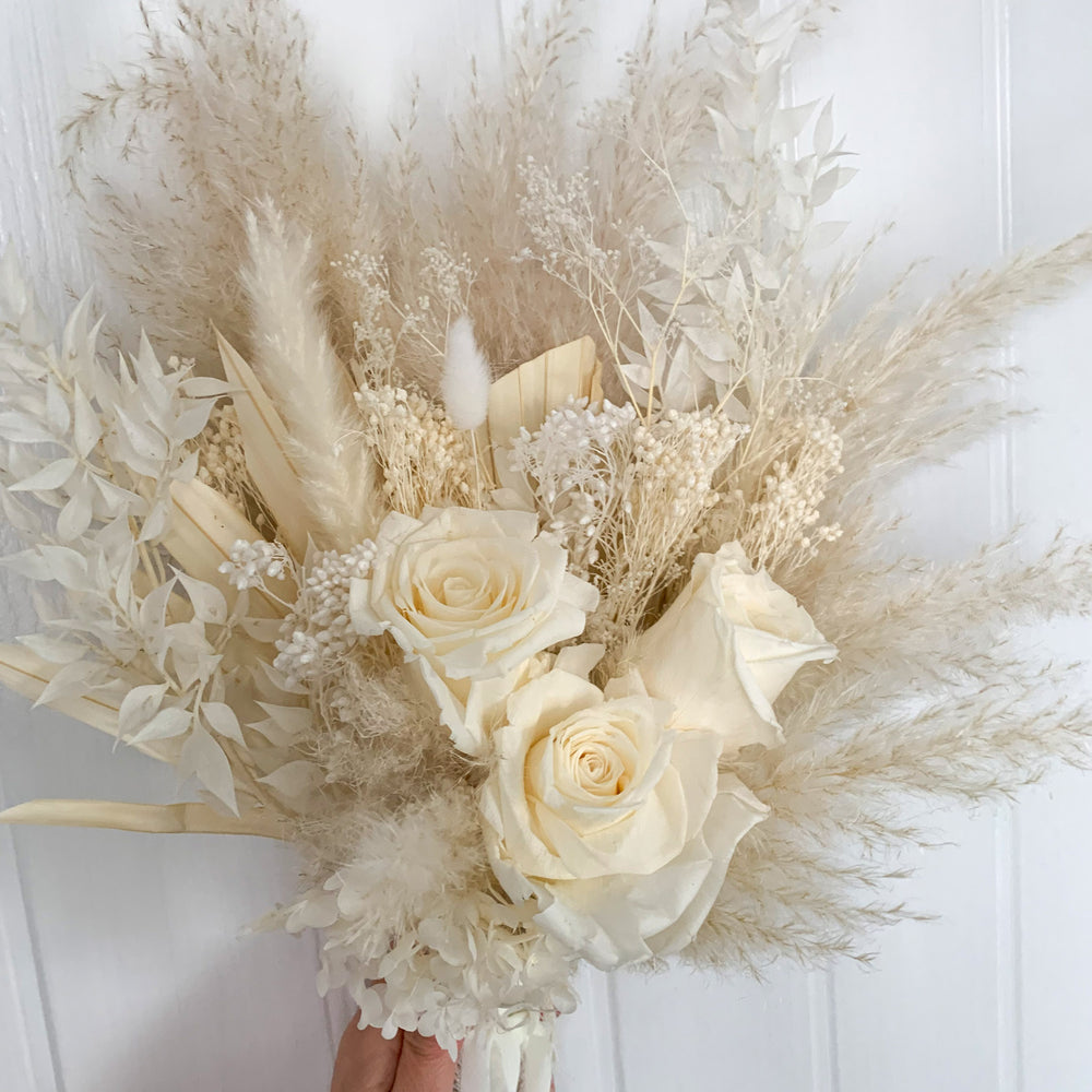 
                      
                        white rose wedding bouquet
                      
                    