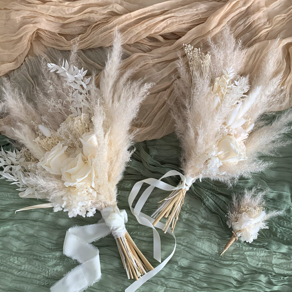 
                      
                        white rose bridal bouquet with pampas
                      
                    