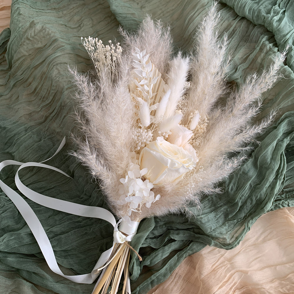 
                      
                        white rose bridesmaid bouquet
                      
                    