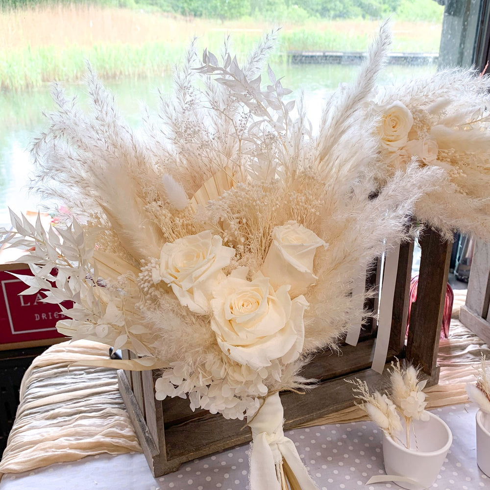 
                      
                        white rose wedding bouquet with pampas
                      
                    